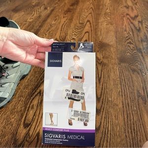 Maternity compression stockings. Full length, with belly.